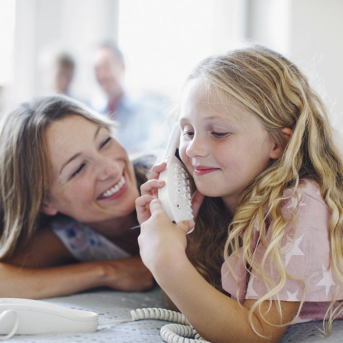 Child talking on landline
